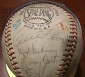 Curt Flood's autograph, with some Cardinal teammates, on a baseball owned by my son Joe.