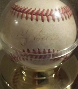 My baseball autographed by Yogi Berra